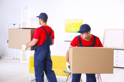 Moving team planning a home removal in a Ruislip residential street