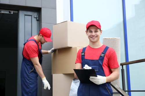 Removal team discussing a transparent quote for a local move