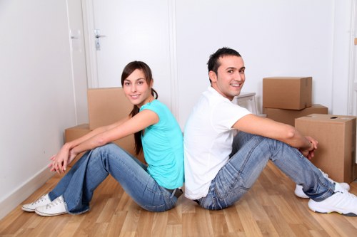 Careful lifting of household furniture during a local removal service